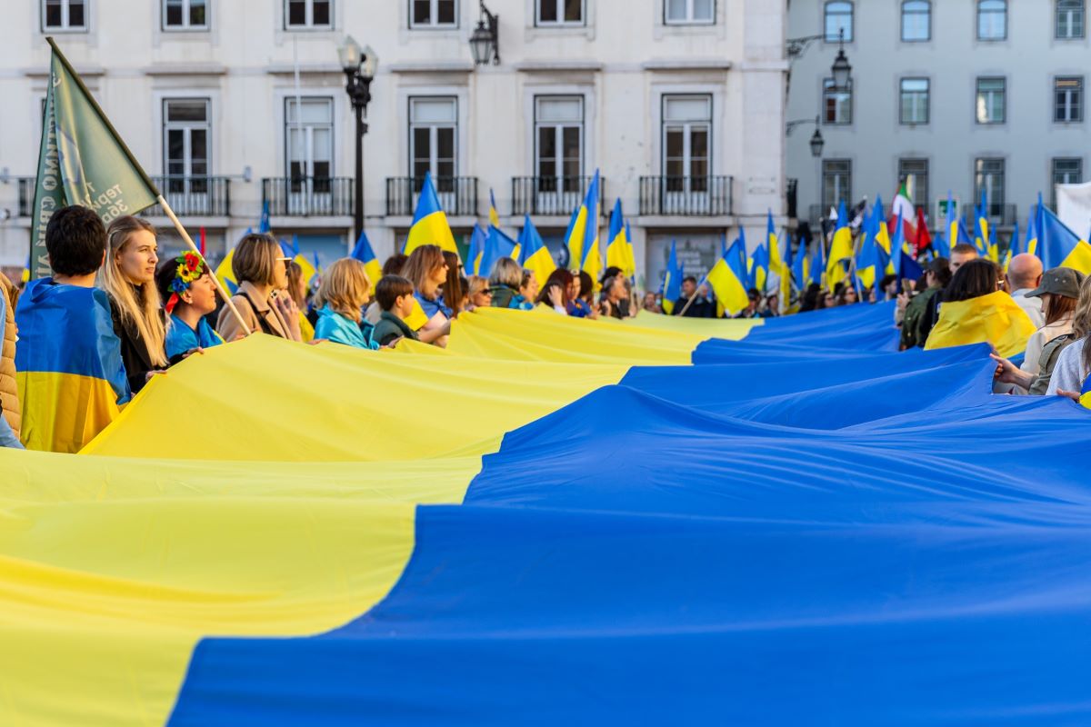Flags were raised and the call "Slava Ukrayine" was chanted